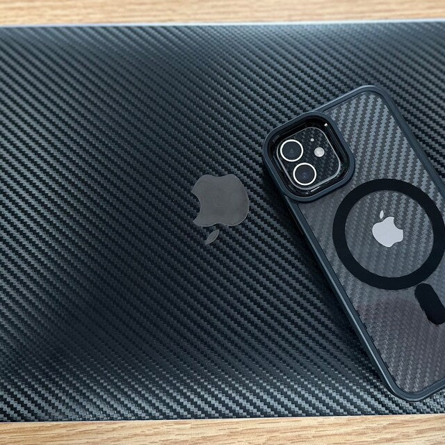 Real Customer Using Black Carbon Vinyl Skin on Apple iPhone 16 and Macbook