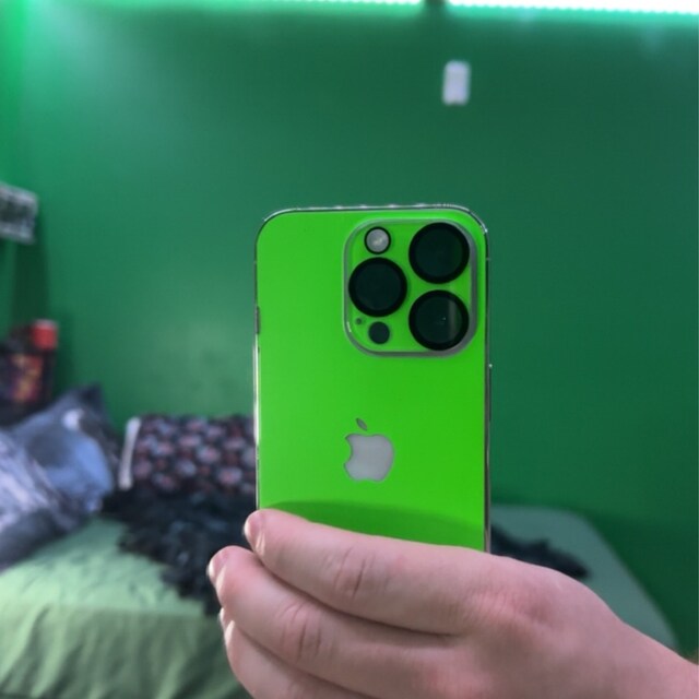 Real Customer Using Neon Green Vinyl Skin on Apple iPhone 16 Pro